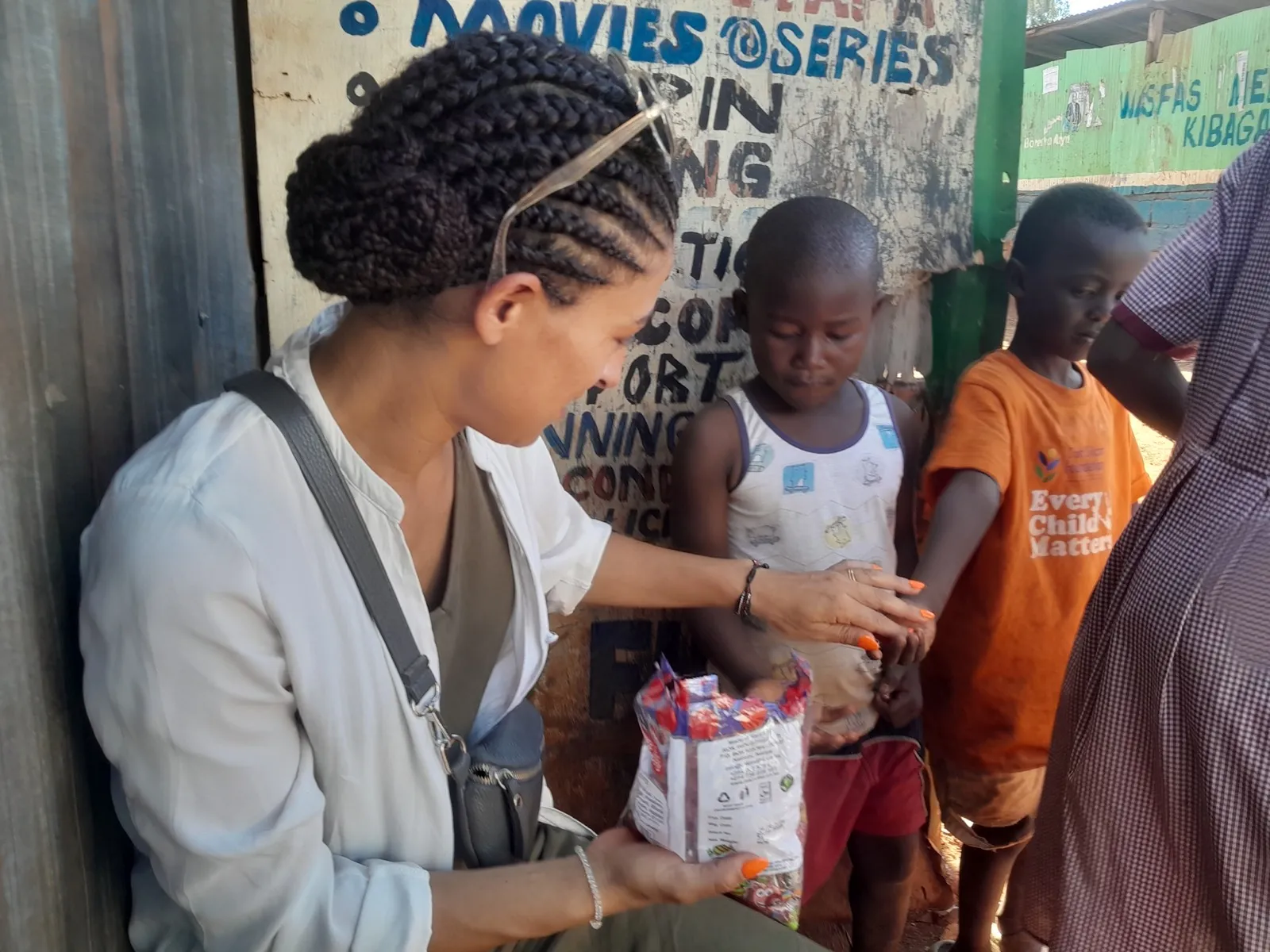 Volunteers and children